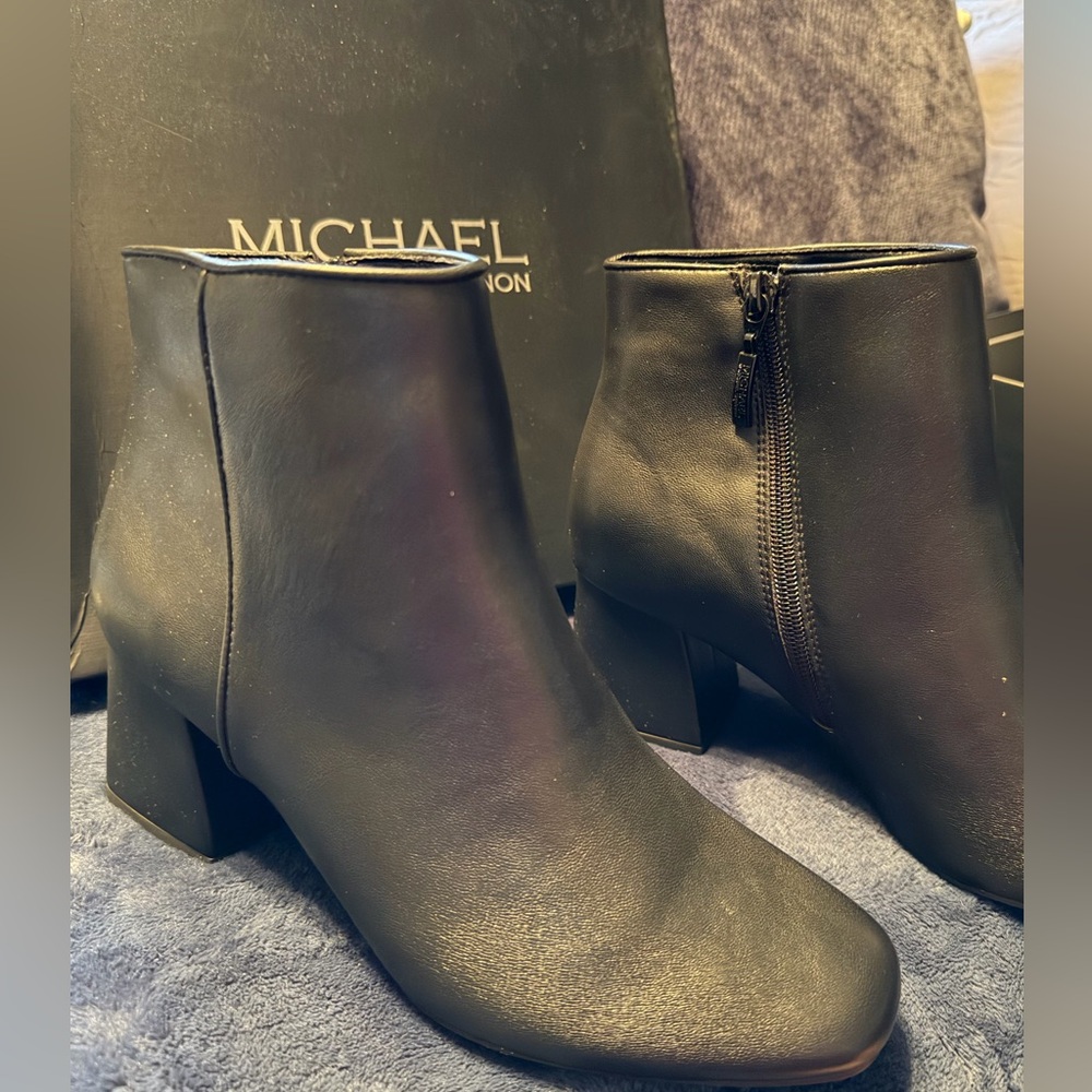Michael Kors women’s Sleek Black Ankle Booties
